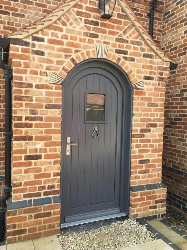 Contemporary door with curve top