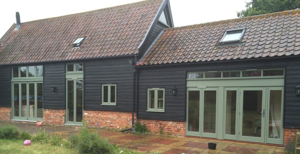 wooden windows and doors in barn conversion