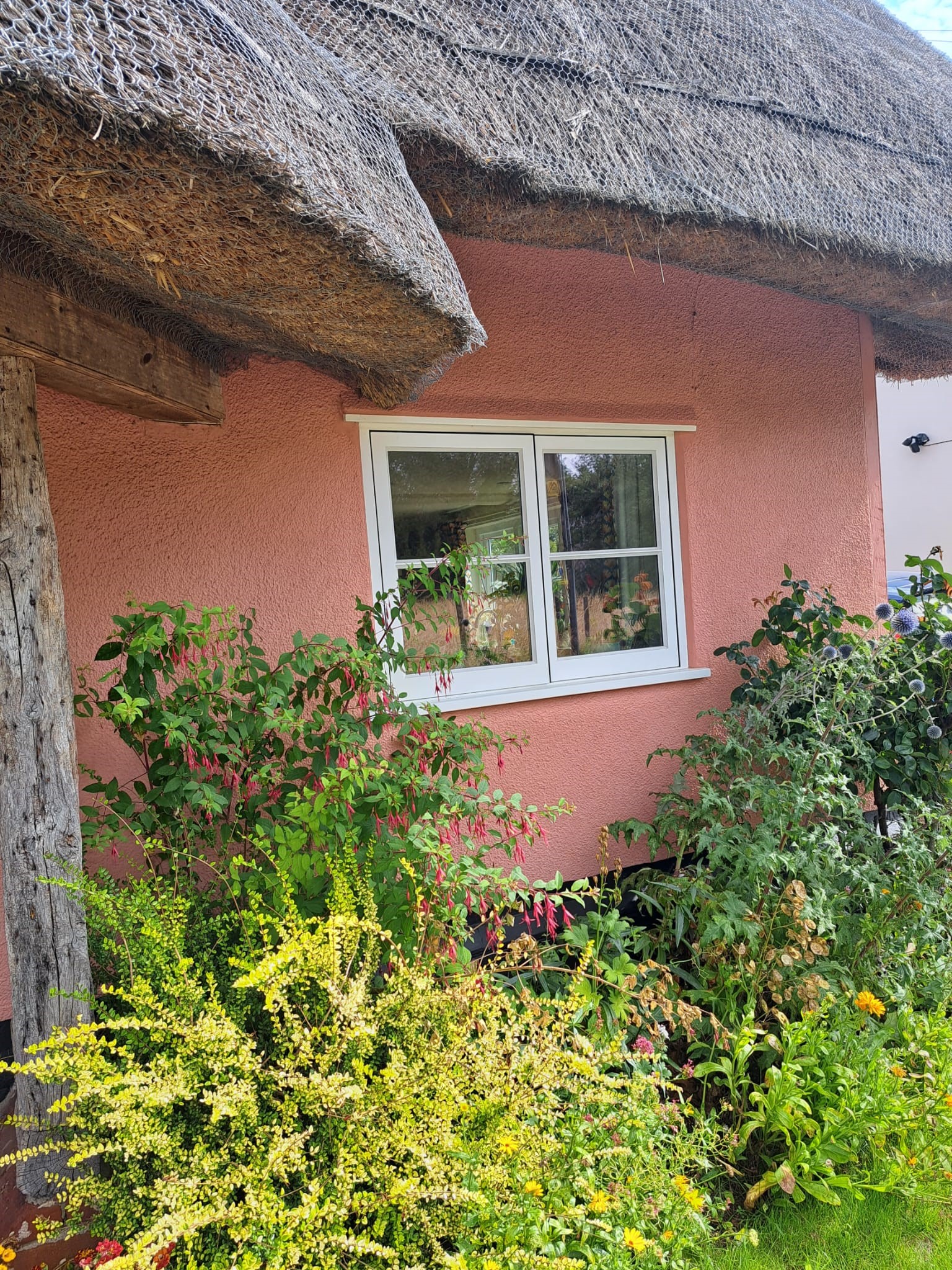Historic window in thatched cottage