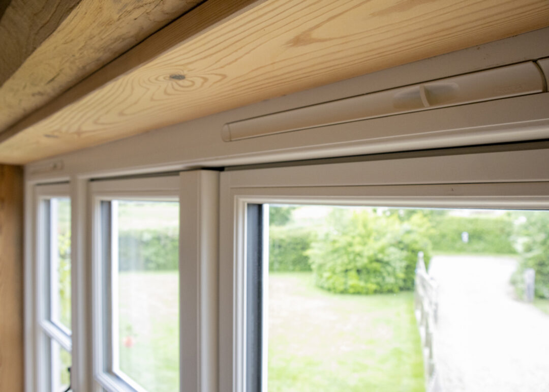 Wooden window with trickle vents